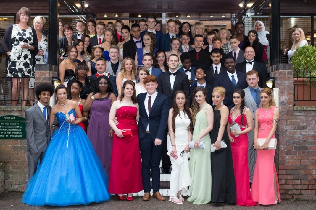 ARK Kings Academy Year 11 class of 2015 pose for a photograph with staff at their leavers' prom 2015