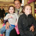 Bettina Reece, with her nieces, Taylor, 2 and Keeley 6, Humphrey, who enjoyed the fashion shows at Northfield Shopping Centre.