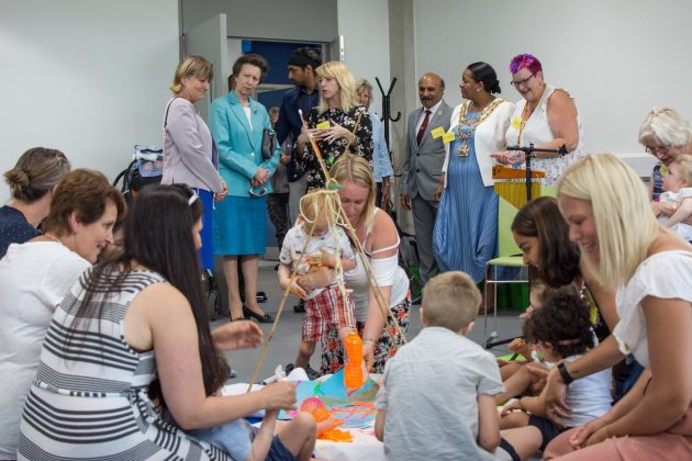 HRH The Princess Royal oversees a family session at the new TouchBase Pears centre