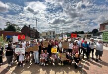 Councillor joins residents in friendly protest against proposal of McDonald’s Drive-Through